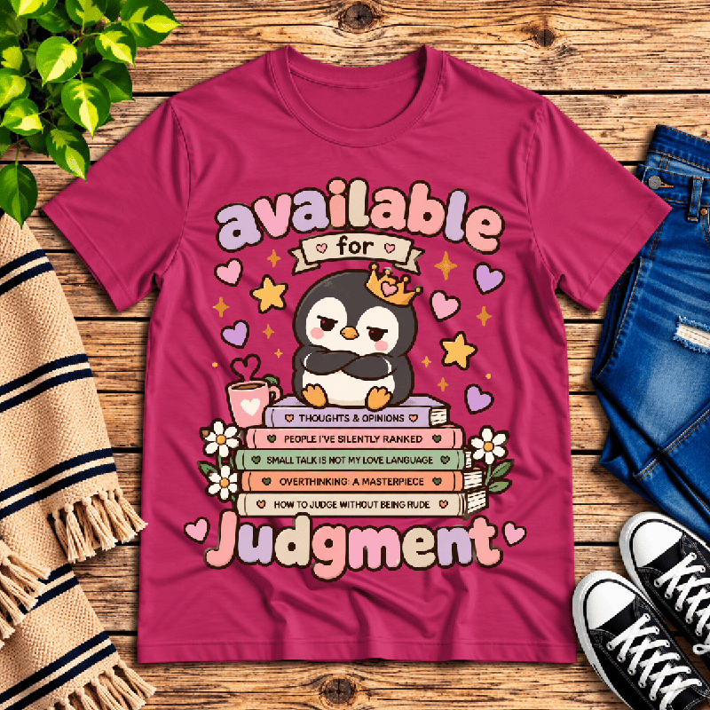 Available For Judgement Premium T-Shirt in berry pink, flat lay with penguin and books graphic