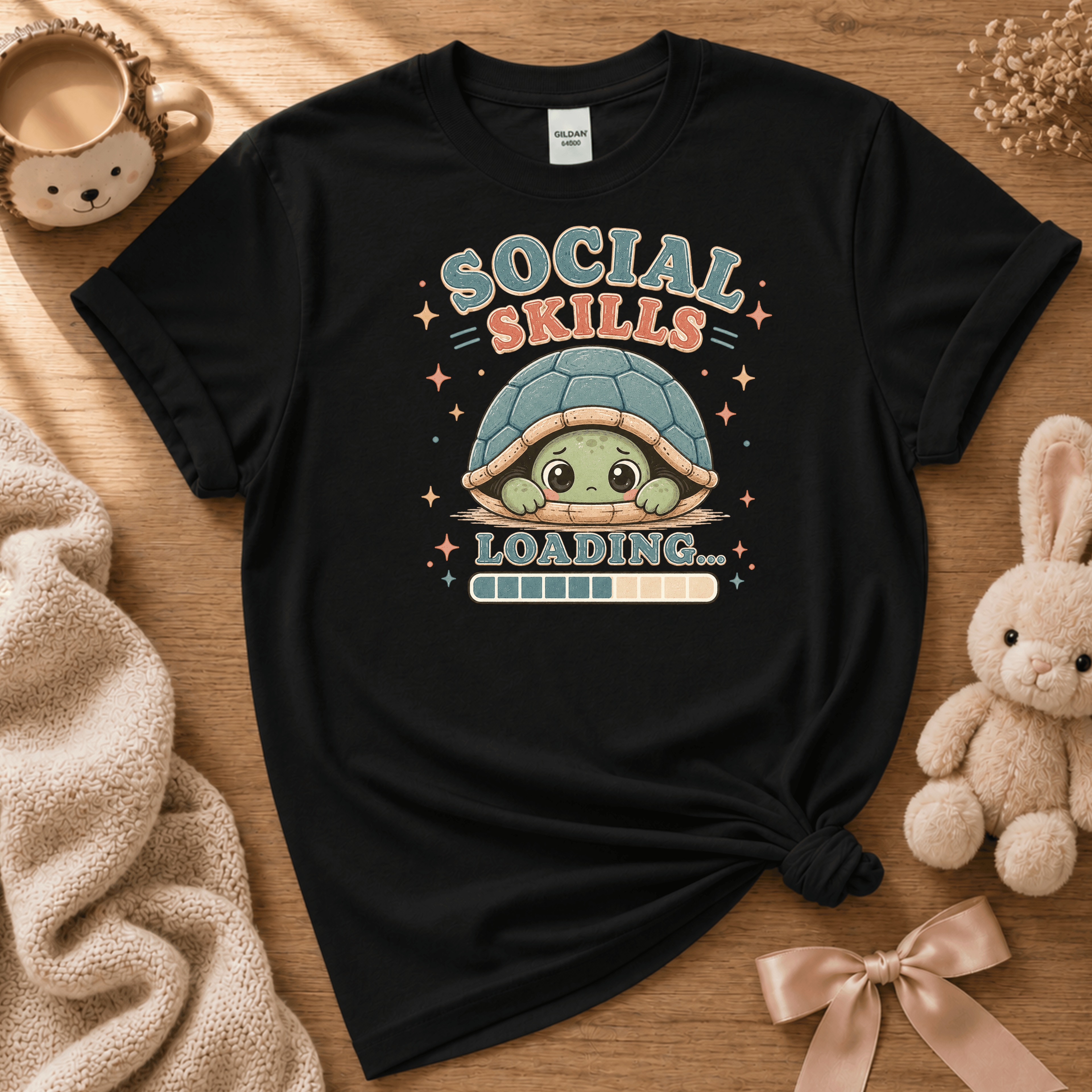 Social Skills cute animal graphic t-shirt displayed in a cozy flat lay in black.