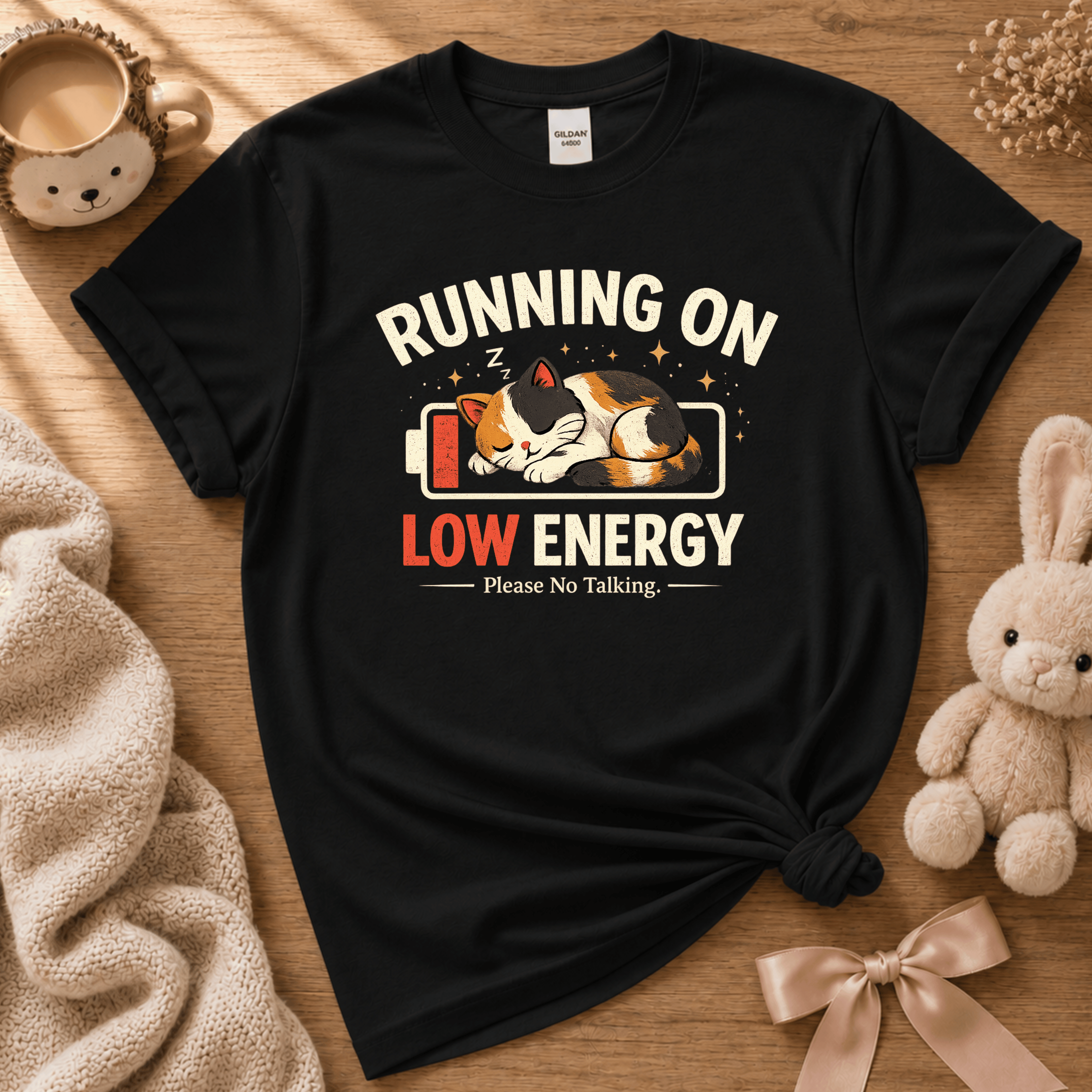 Low Energy cute animal graphic t-shirt cozy flat lay in black.