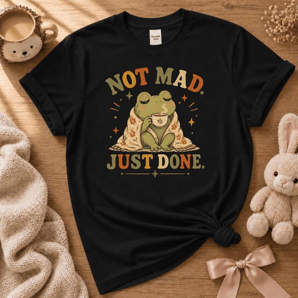 Just Done cute animal graphic t-shirt displayed in a cozy flat lay in black.