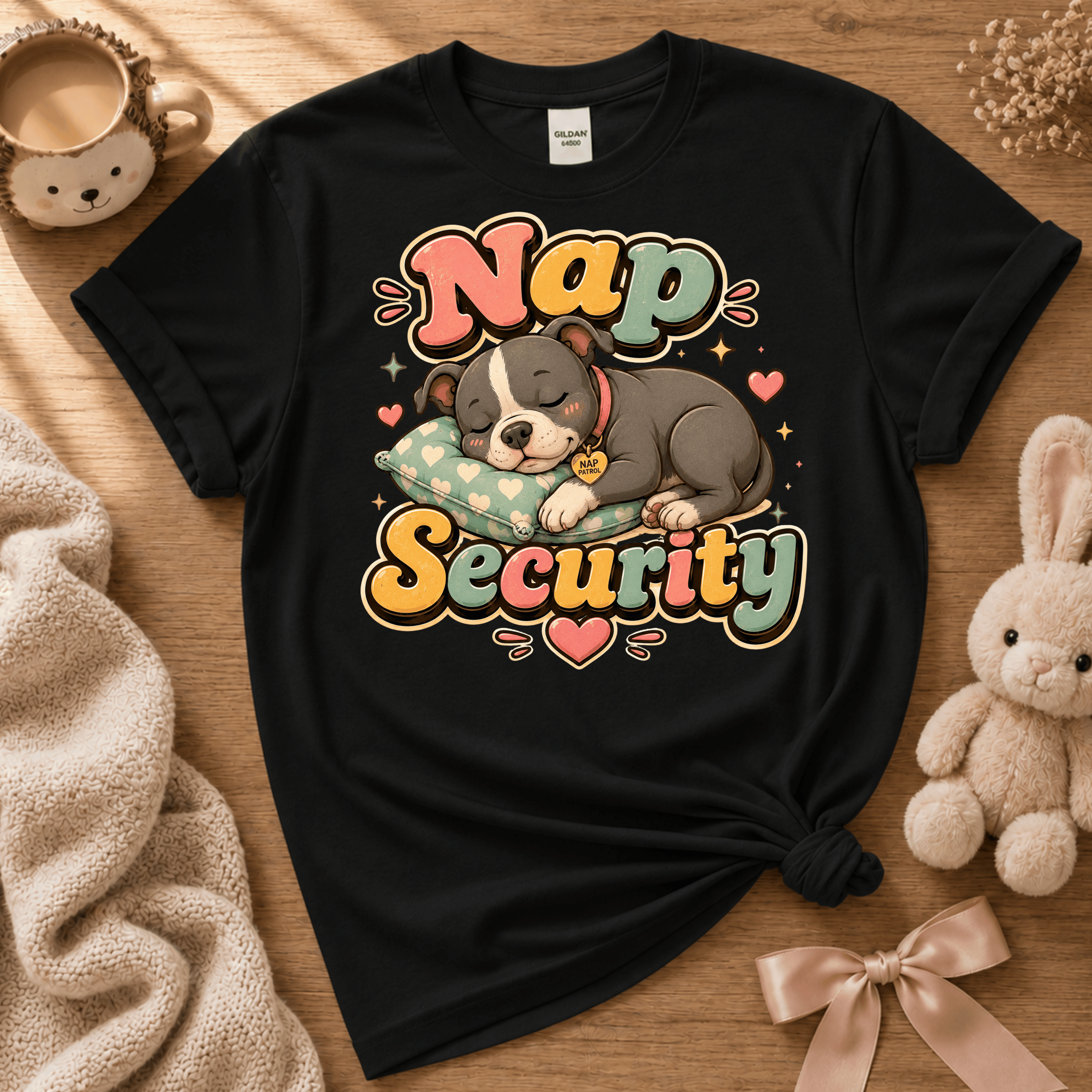 Nap Security cute animal graphic t-shirt displayed in a cozy flat lay in black.