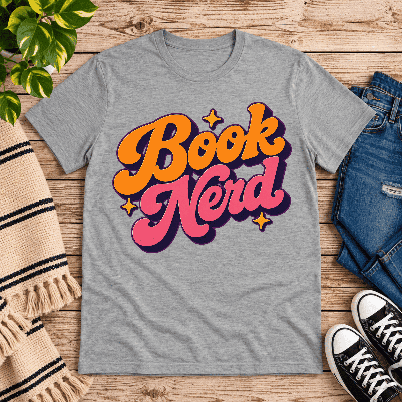 Book Nerd Premium T-Shirt in athletic heather gray, flat lay with retro Book Nerd script graphic