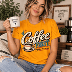 Woman holding a "But First, Coffee" mug, wearing the Coffee First Premium T-Shirt in gold