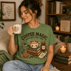 Woman holding a floral mug, wearing the Coffee Magic Premium T-Shirt in sage green