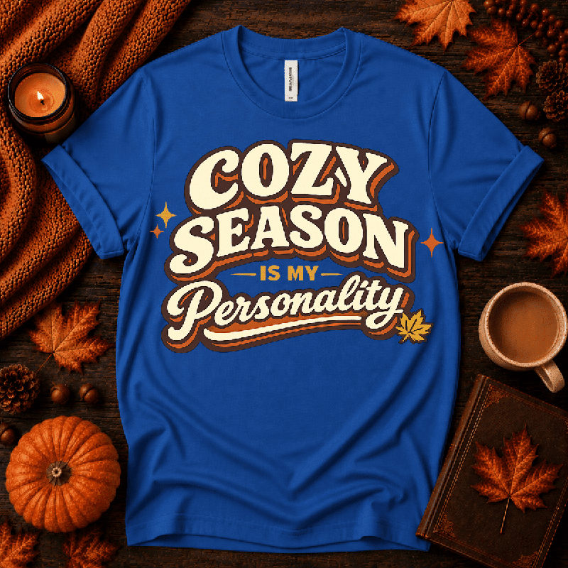 Cozy Season Premium T-Shirt in true royal blue, flat lay with fall props