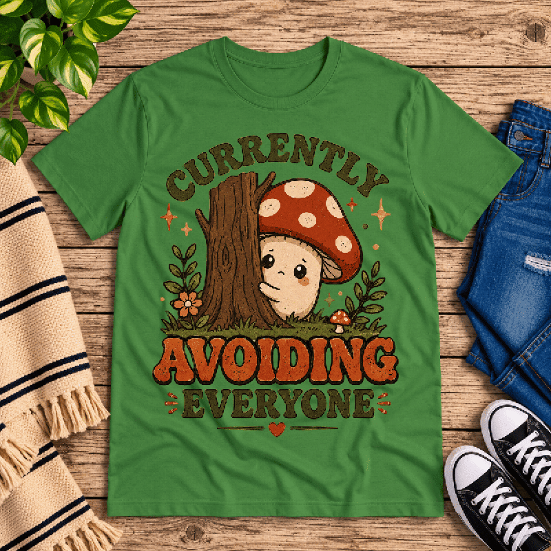 Currently Avoiding Premium T-Shirt in leaf green, flat lay