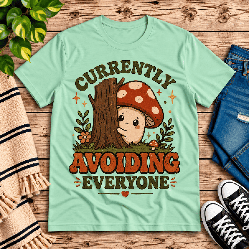 Currently Avoiding Premium T-Shirt in mint, flat lay