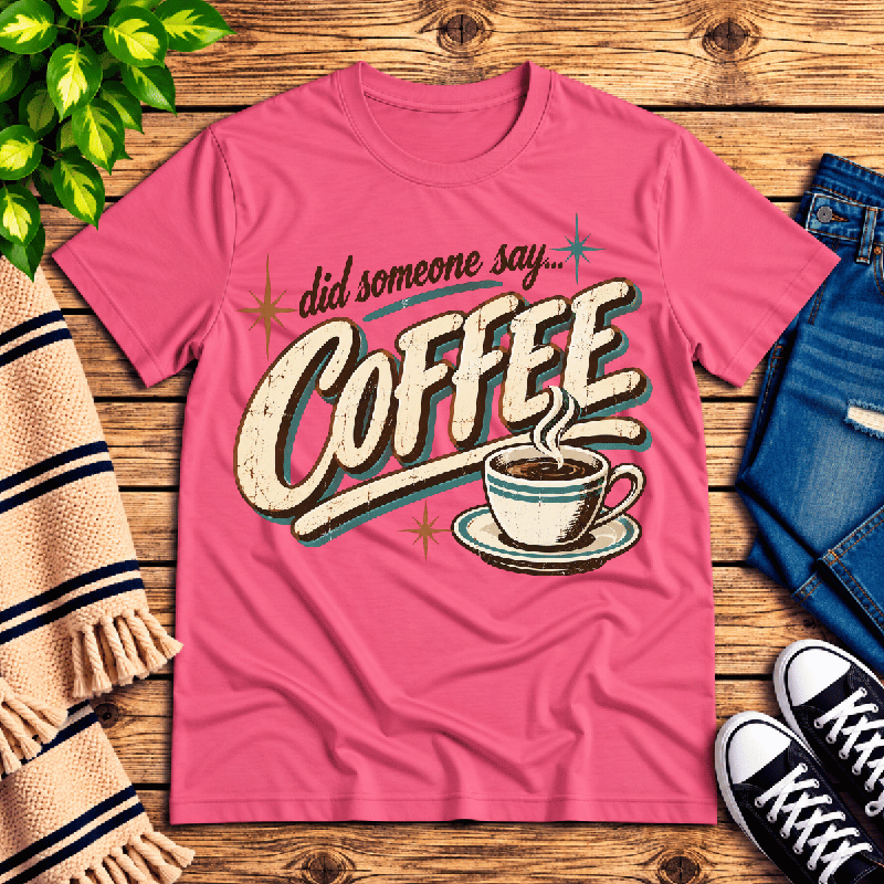 Did Someone Say Coffee Premium T-Shirt in charity pink, flat lay with retro coffee cup and star graphic