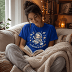Woman reading a book, wearing the Floating In Space Premium T-Shirt in true royal blue