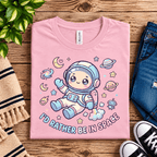 Floating In Space Premium T-Shirt in pink, folded close-up with neck tag showing