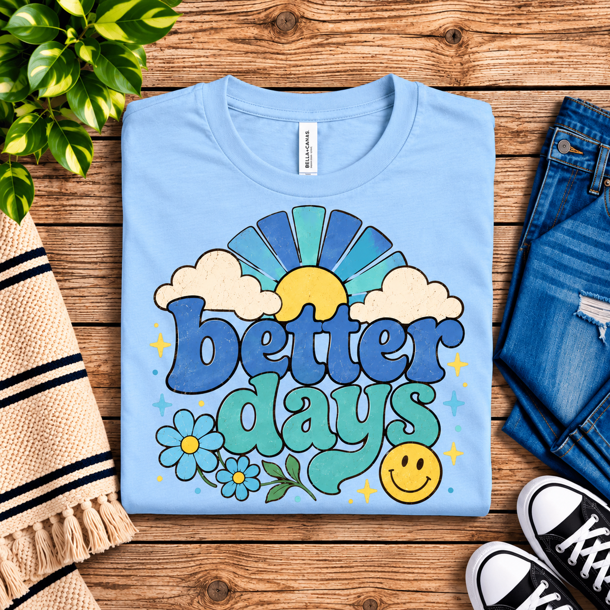 A folded mockup of Better Days inspirational introvert graphic t-shirt in baby blue.