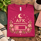 A folded mockup of AFK funny introvert graphic t-shirt in berry.