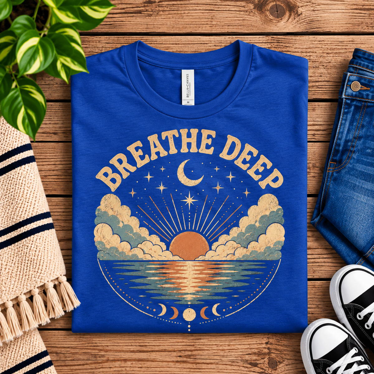 A folded mockup of Breathe Deep inspirational introvert graphic t-shirt in true royal.