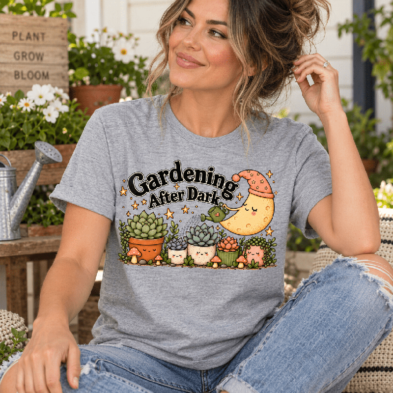 Woman wearing the Gardening After Dark Premium T-Shirt in athletic heather gray outdoors
