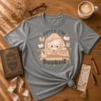 I'm Booked book lover graphic t-shirt displayed in a cozy flat lay in graphite heather.