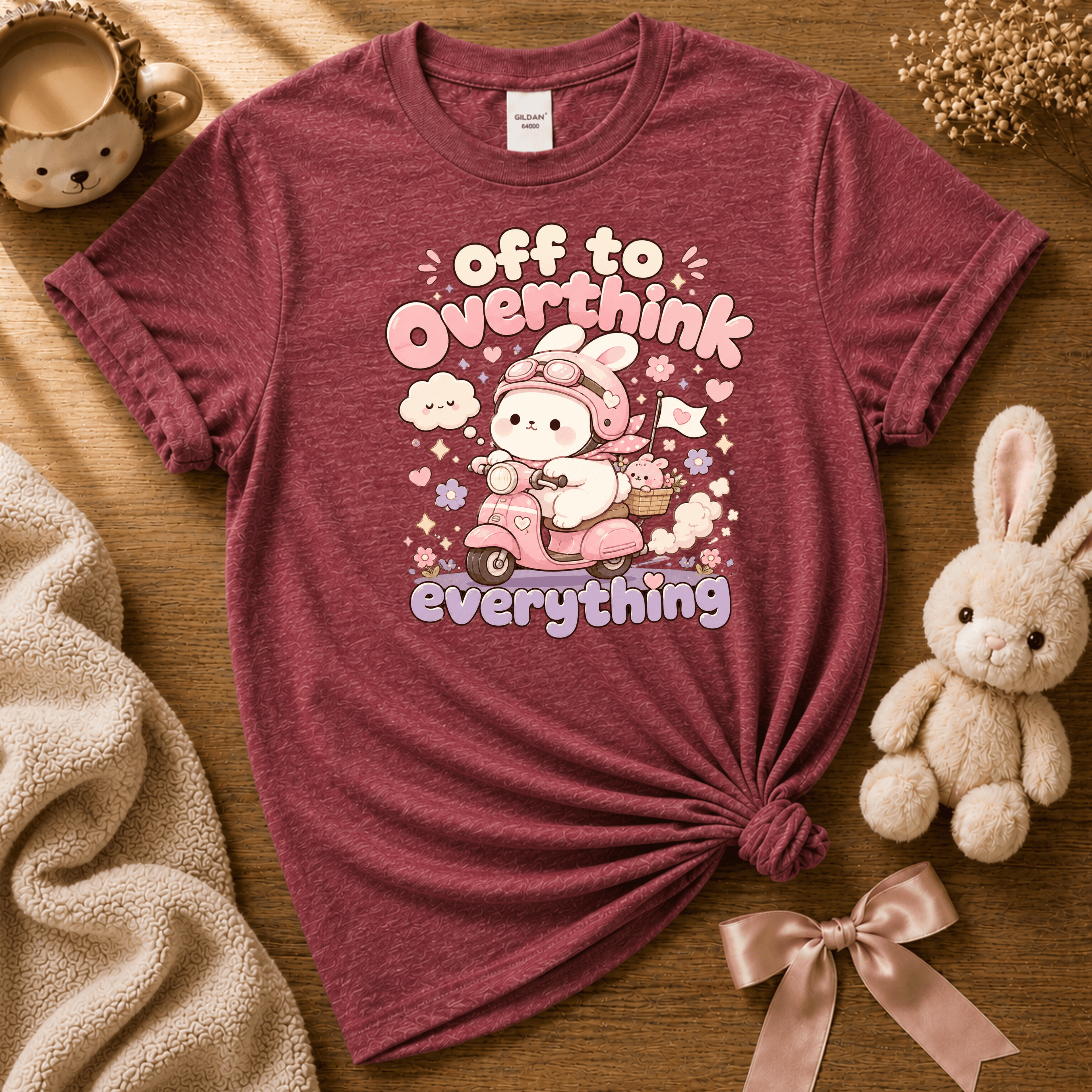 Overthink Bunny cute animal graphic t-shirt displayed in a cozy flat lay in heather cardinal.