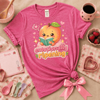 Emotionally Ripening kawaii cute fruit graphic t-shirt displayed in a cozy flat lay in heather heliconia.