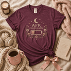 AFK introvert graphic t-shirt cozy flat lay in heather maroon.