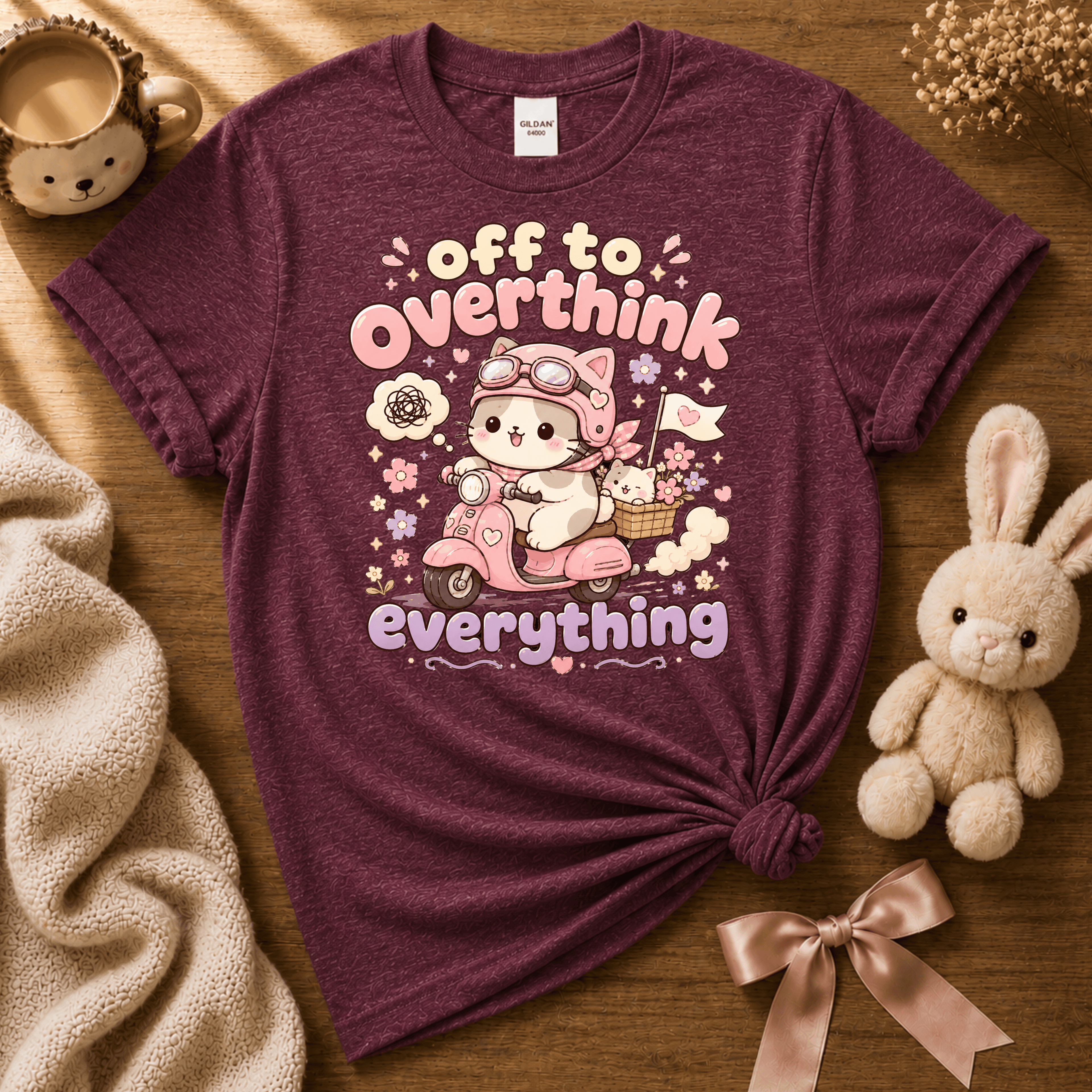 Overthink Cat cute animal graphic t-shirt cozy flat lay in heather maroon.