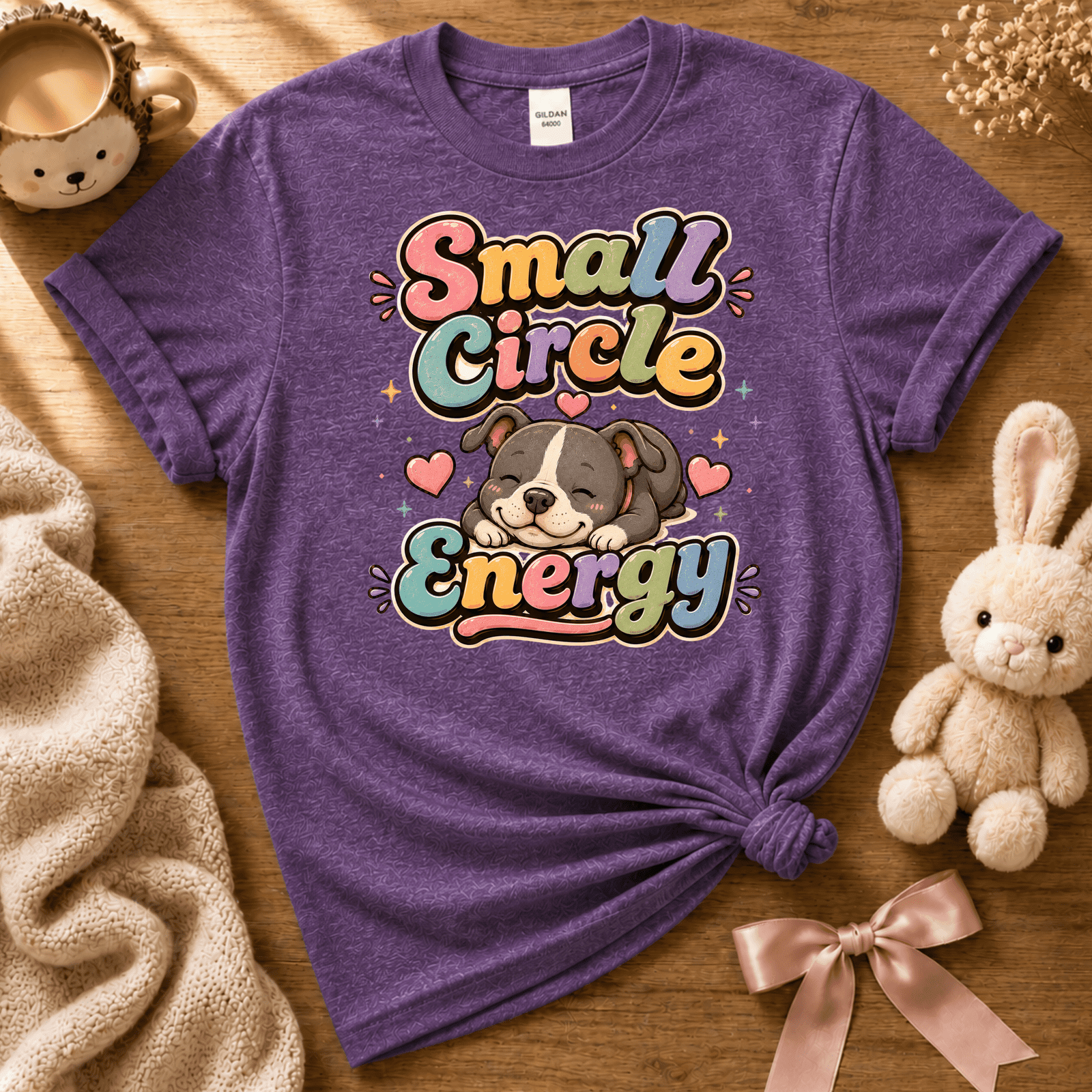 Small Circle Energy cute animal graphic t-shirt displayed in a cozy flat lay in heather purple.