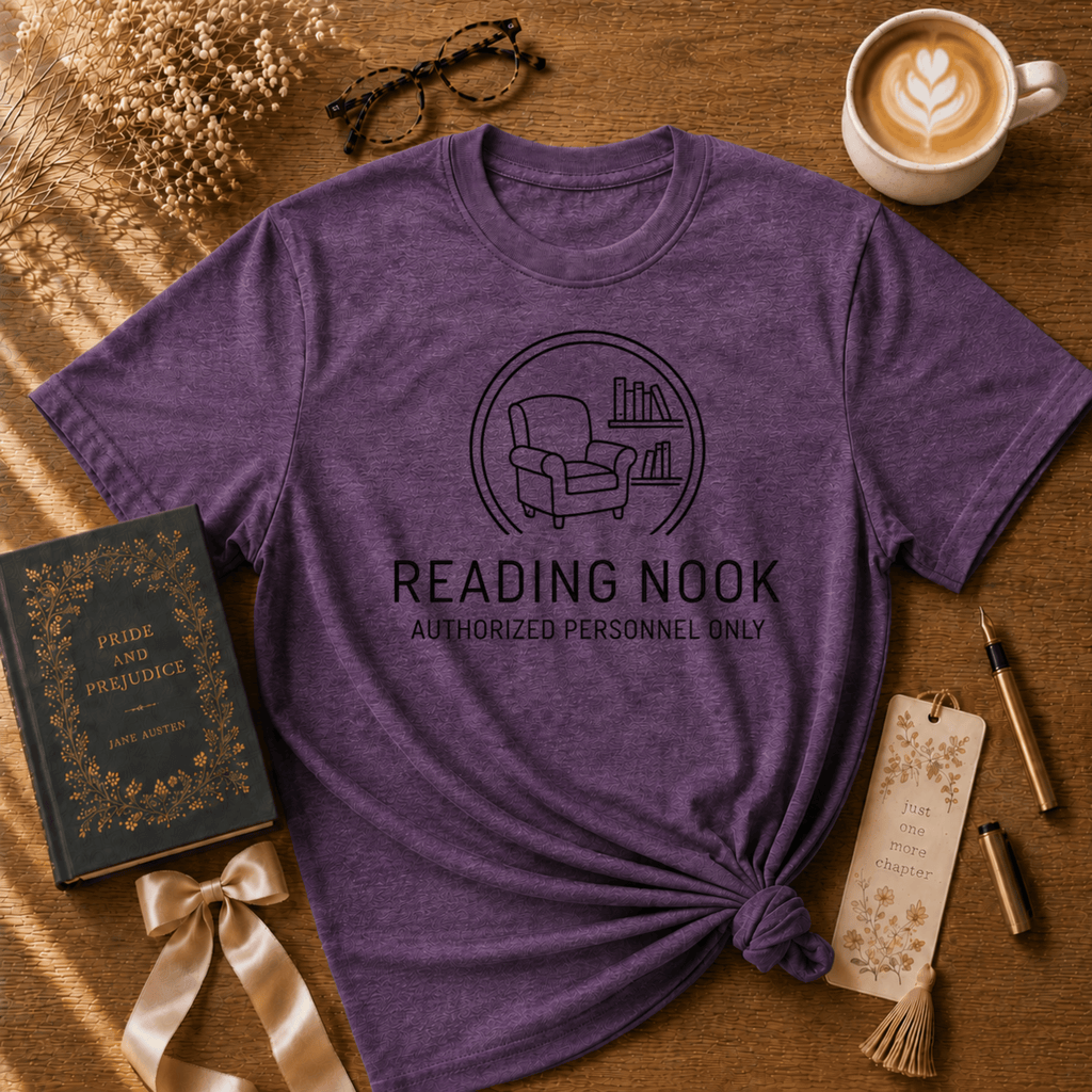 Reading Nook book lover graphic t-shirt cozy flat lay in heather purple.
