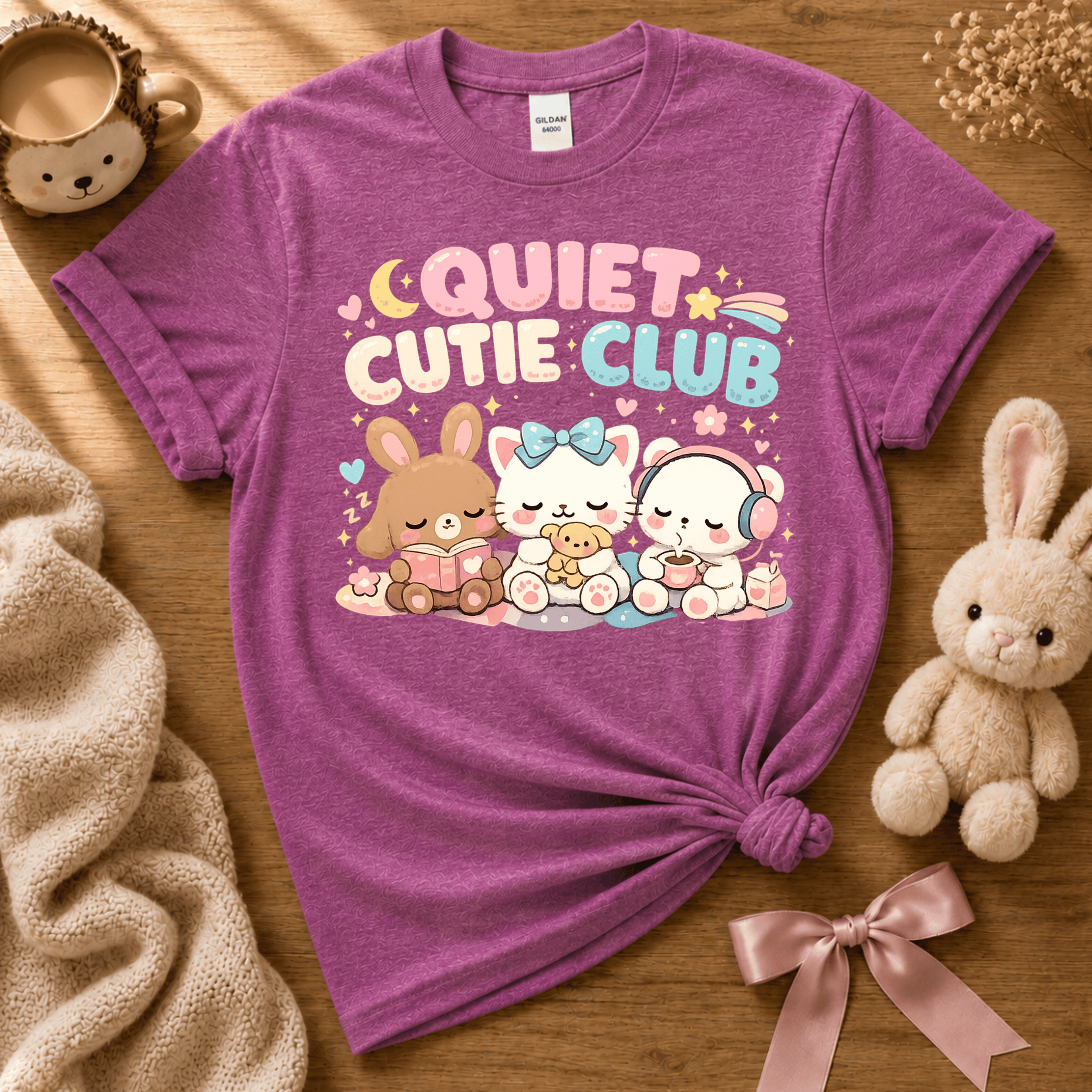 Quiet Cutie Club 2 cute animal graphic t-shirt displayed in a cozy flat lay in heather radiant orchid.