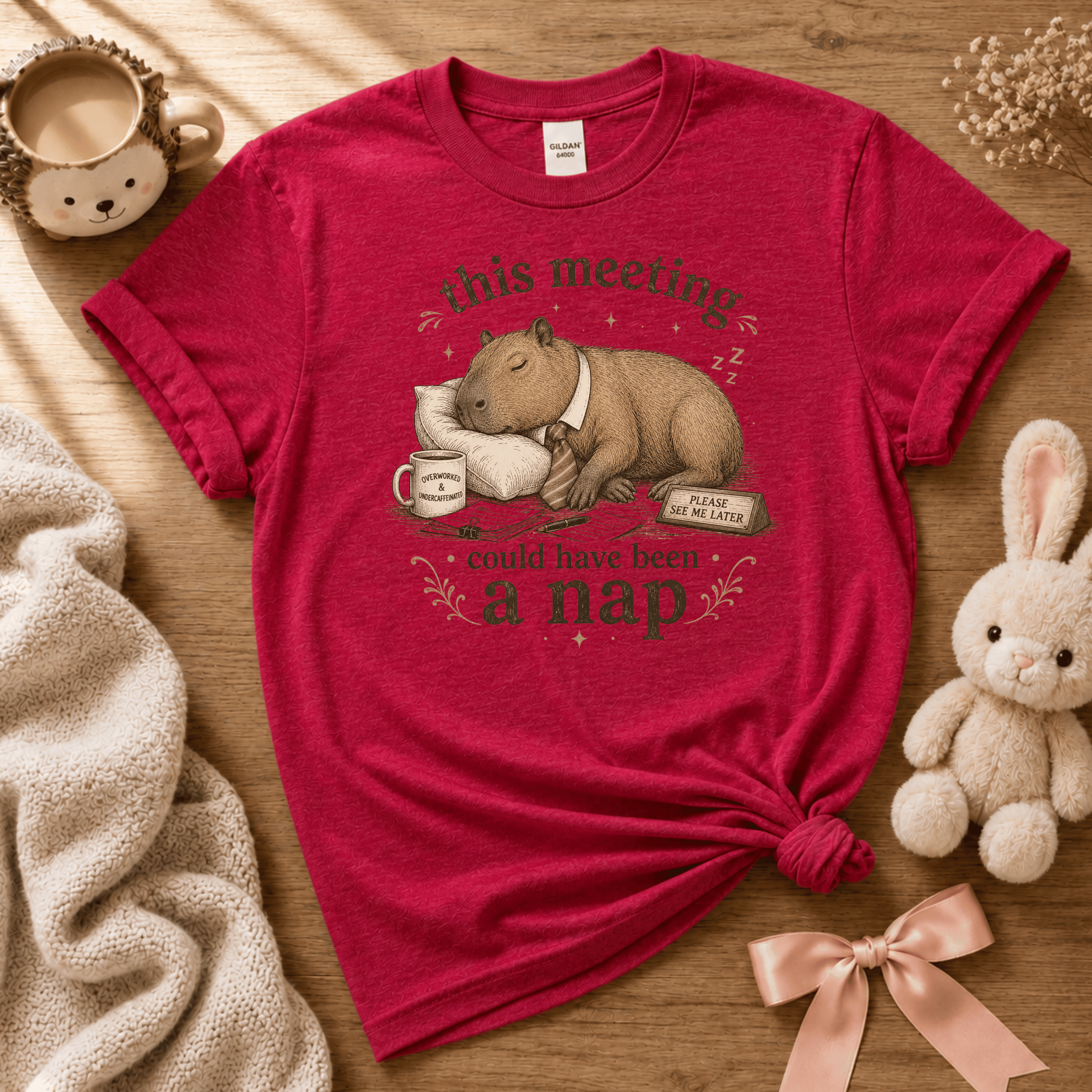 This Meeting cute animal graphic t-shirt cozy flat lay in heather red.