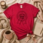Left The House introvert graphic t-shirt cozy flat lay in heather red.