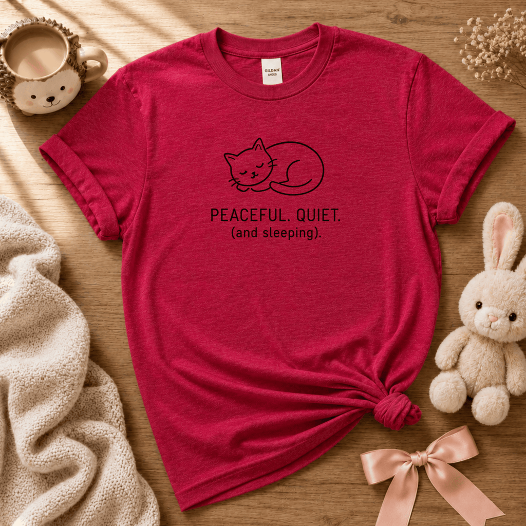 Peaceful, Quiet cute animal graphic t-shirt cozy flat lay in heather red.