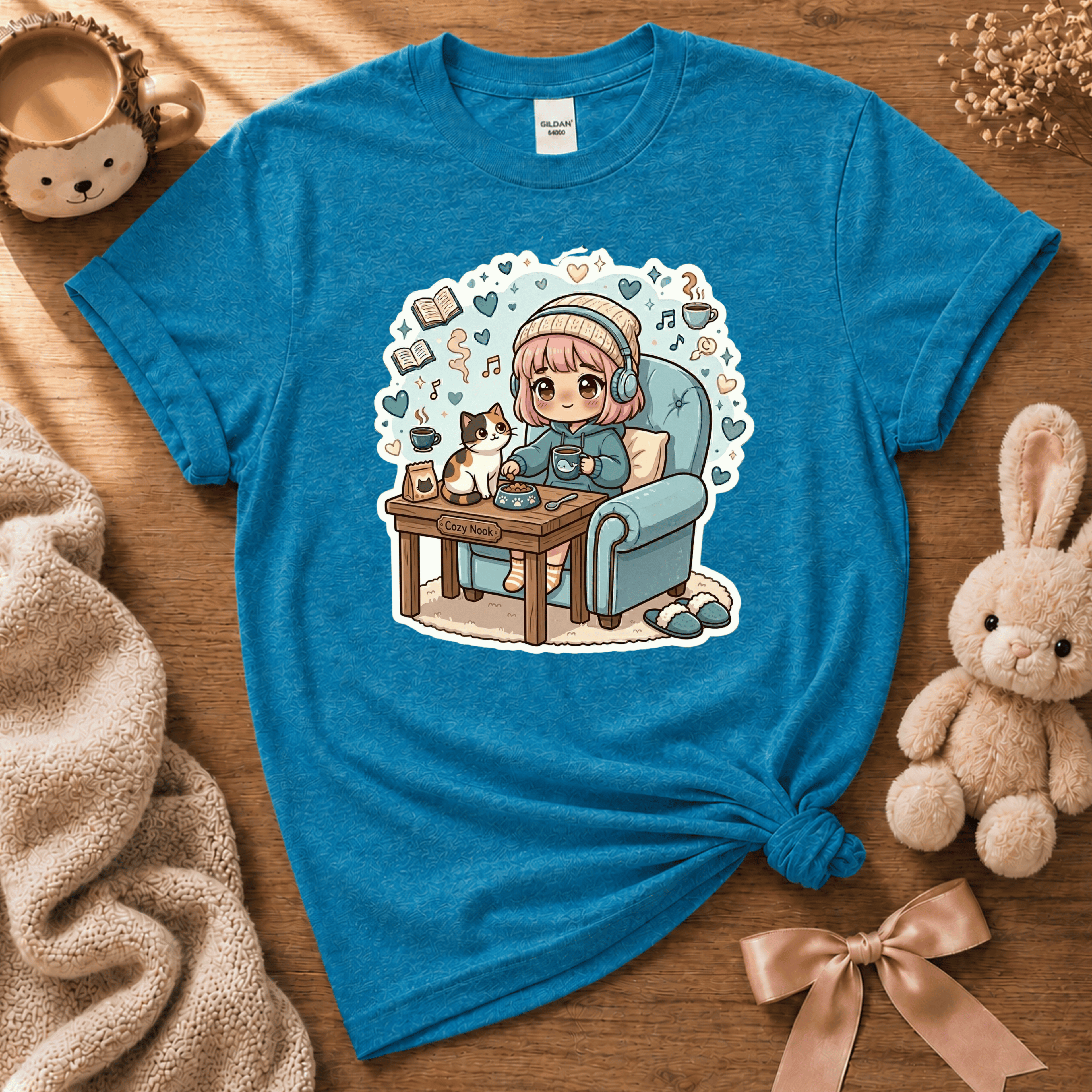 Cat Cozy Nook cute animal graphic t-shirt cozy flat lay in heather sapphire.