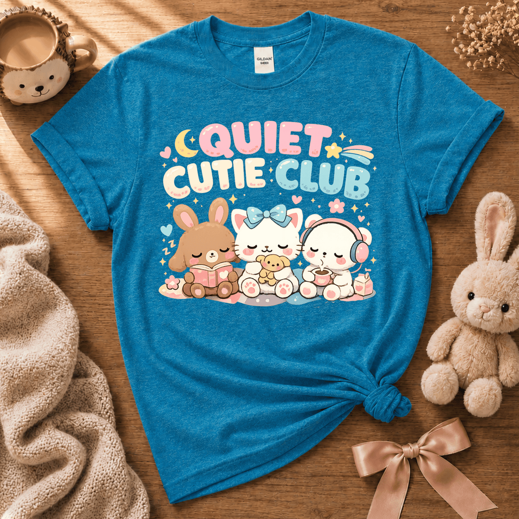 Quiet Cutie Club 2 cute animal graphic t-shirt displayed in a cozy flat lay in heather sapphire.