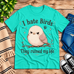 I Hate Birds Premium T-Shirt in heather sea green, flat lay with grumpy cartoon bird graphic