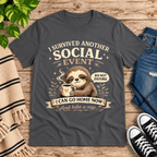 I Survived Premium T-Shirt in asphalt gray, flat lay with sleepy sloth and coffee mug graphic