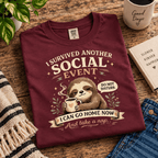 I Survived Premium T-Shirt in maroon, folded close-up with neck tag showing
