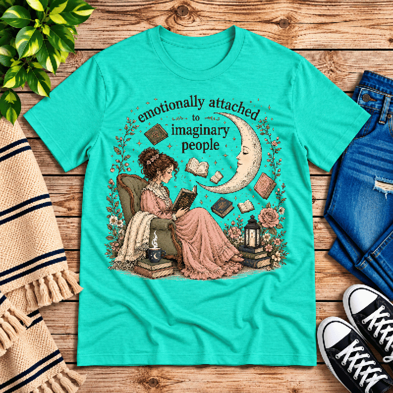 Imaginary People Premium T-Shirt in heather sea green, flat lay with woman reading in an armchair graphic
