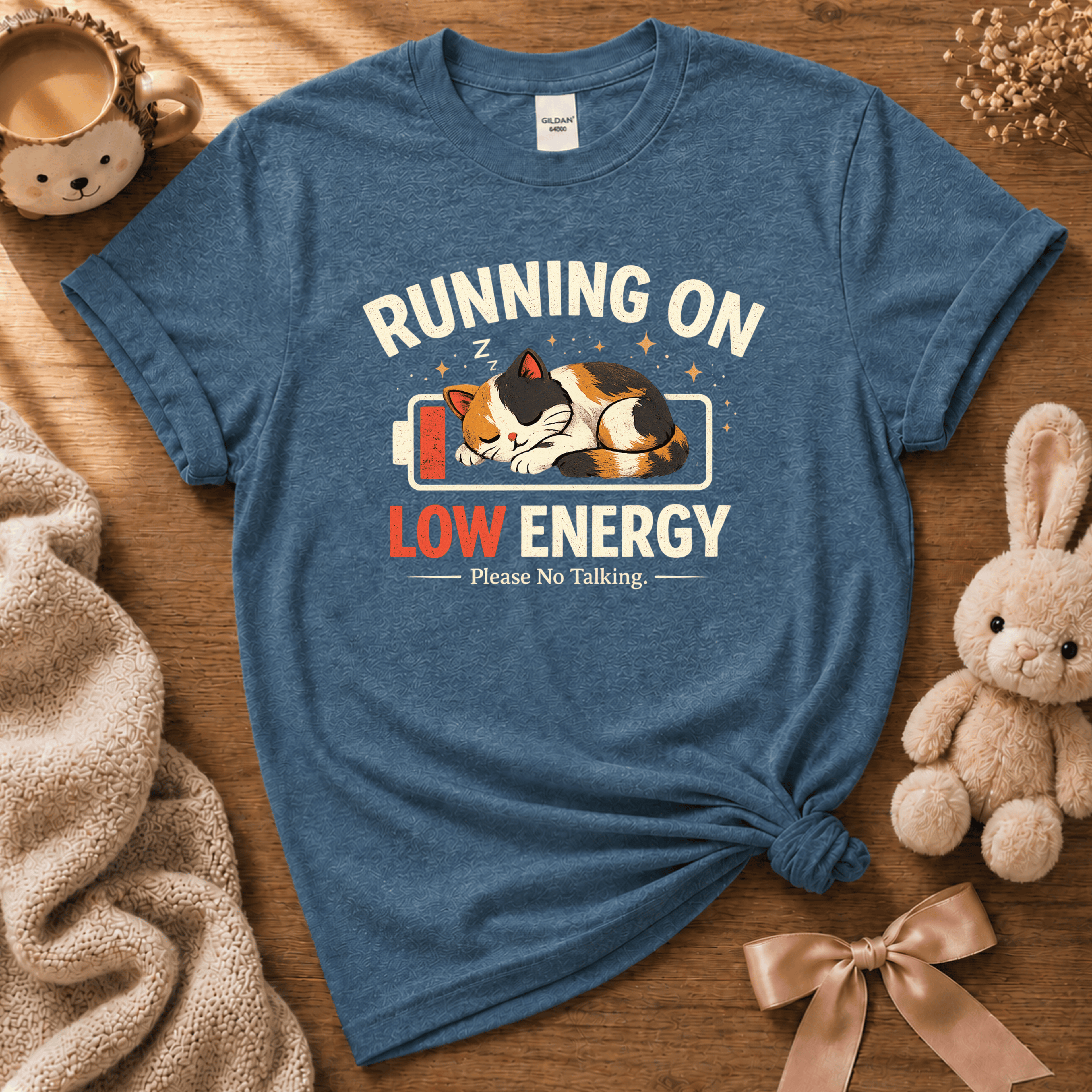 Running on Low Energy cute animal graphic t-shirt cozy flat lay in indigo blue.