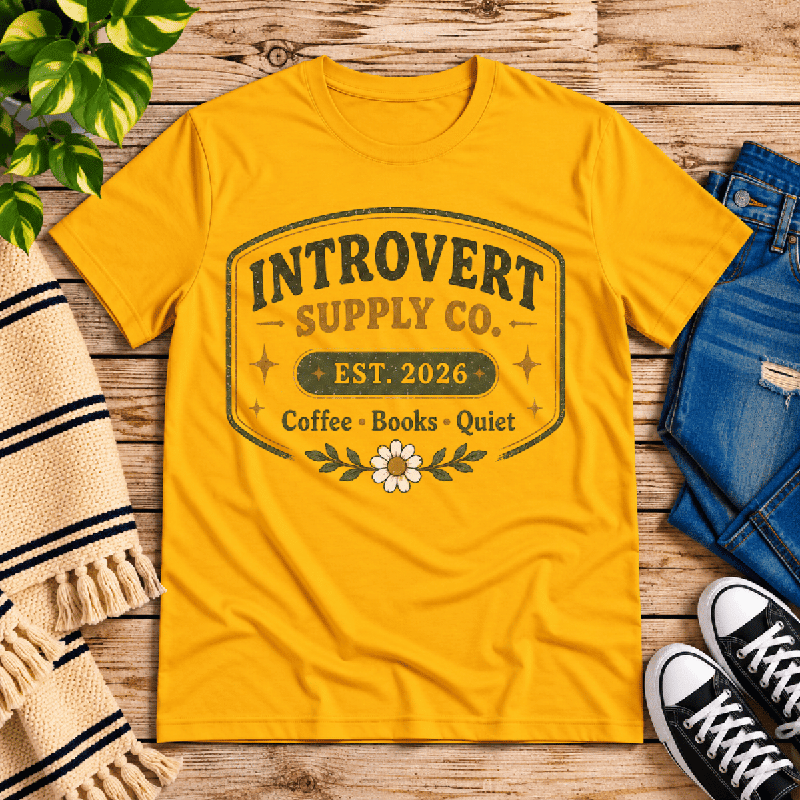 Introvert Supply Co. Premium T-Shirt in gold, flat lay
