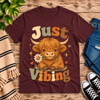Just Vibing Cow Premium T-Shirt in maroon, flat lay