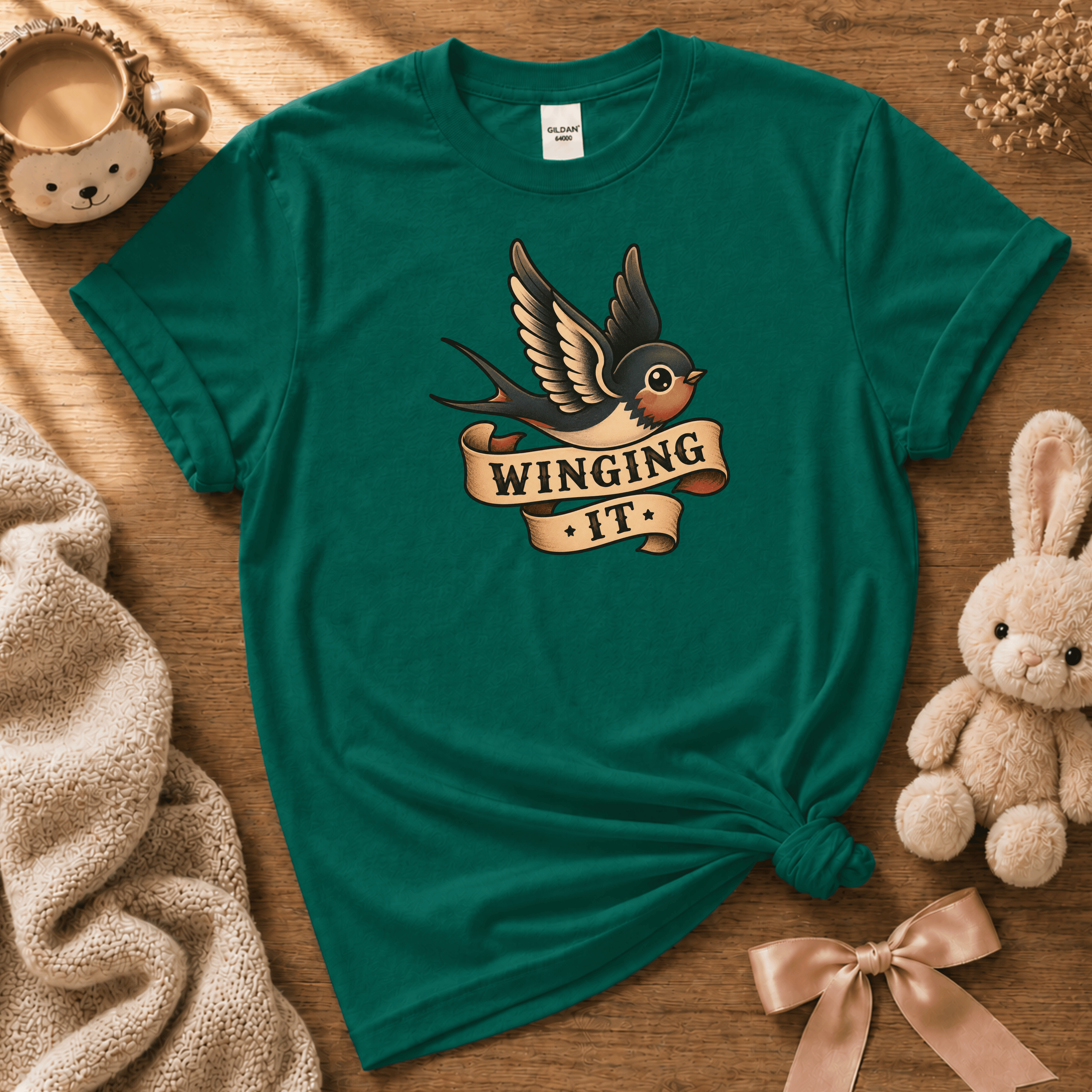 Winging it cute animal graphic t-shirt cozy flat lay in kelly green.