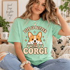Woman smiling and wearing the Life Is Better Premium T-Shirt in mint