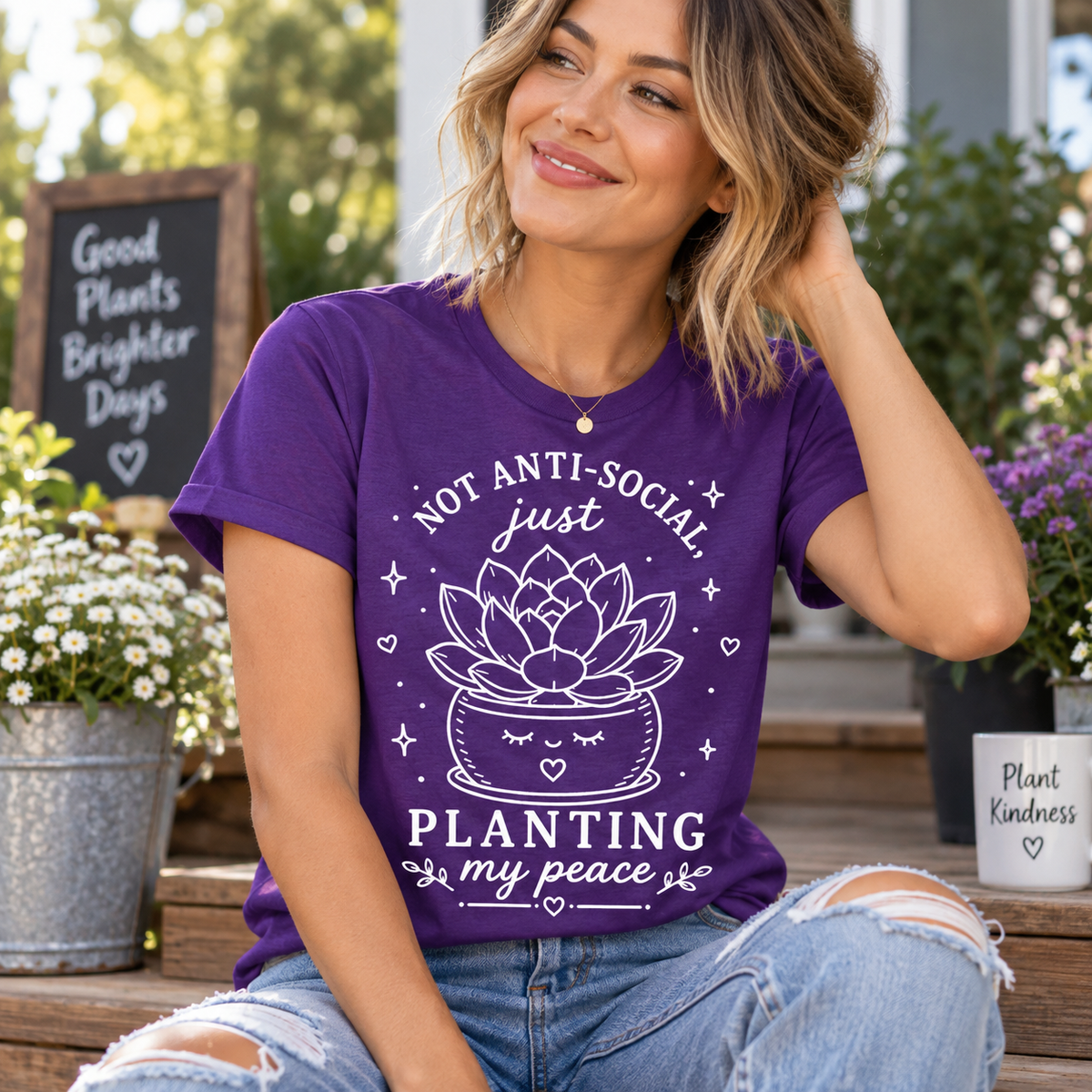A woman wearing a team purple Planting my Peace cute plant graphic t-shirt.