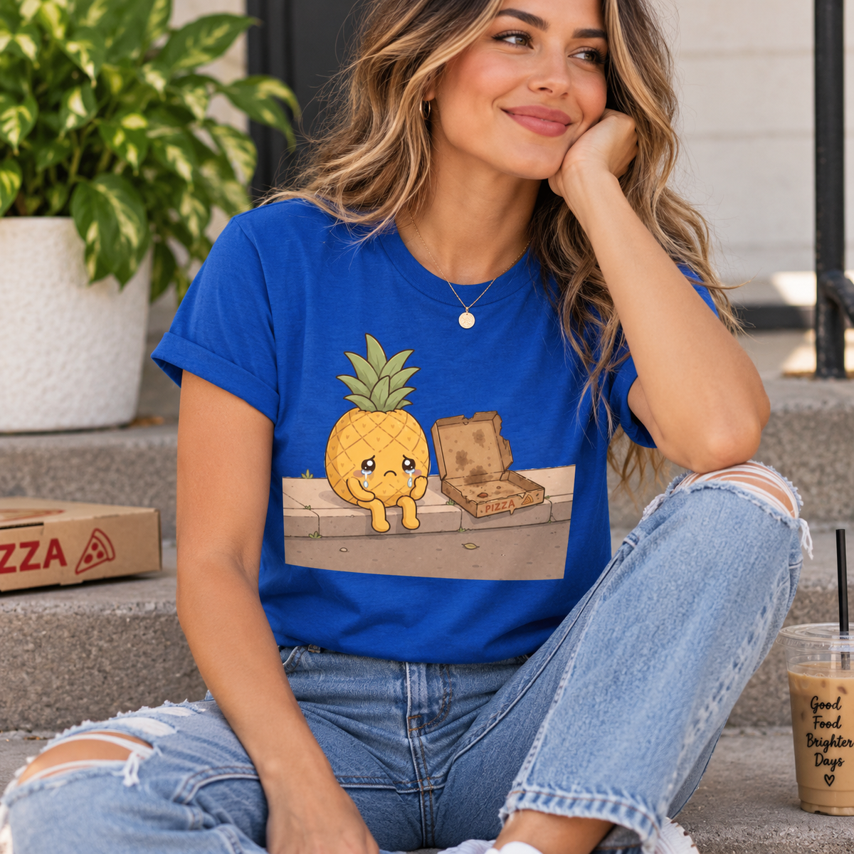 A woman wearing a true royal Pineapple Pizza funny food graphic t-shirt.