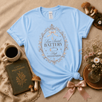 High Standards introvert graphic t-shirt displayed in a cozy flat lay in light blue.