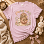 Please wait cottagecore graphic t-shirt cozy flat lay in light pink.
