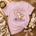 Overthink Cat cute animal graphic t-shirt cozy flat lay in light pink.