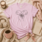 High Standards introvert graphic t-shirt cozy flat lay in light pink.