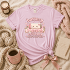Cute Battery introvert graphic t-shirt cozy flat lay in light pink.