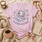 I'd Rather Be In Space introvert graphic t-shirt cozy flat lay in light pink.