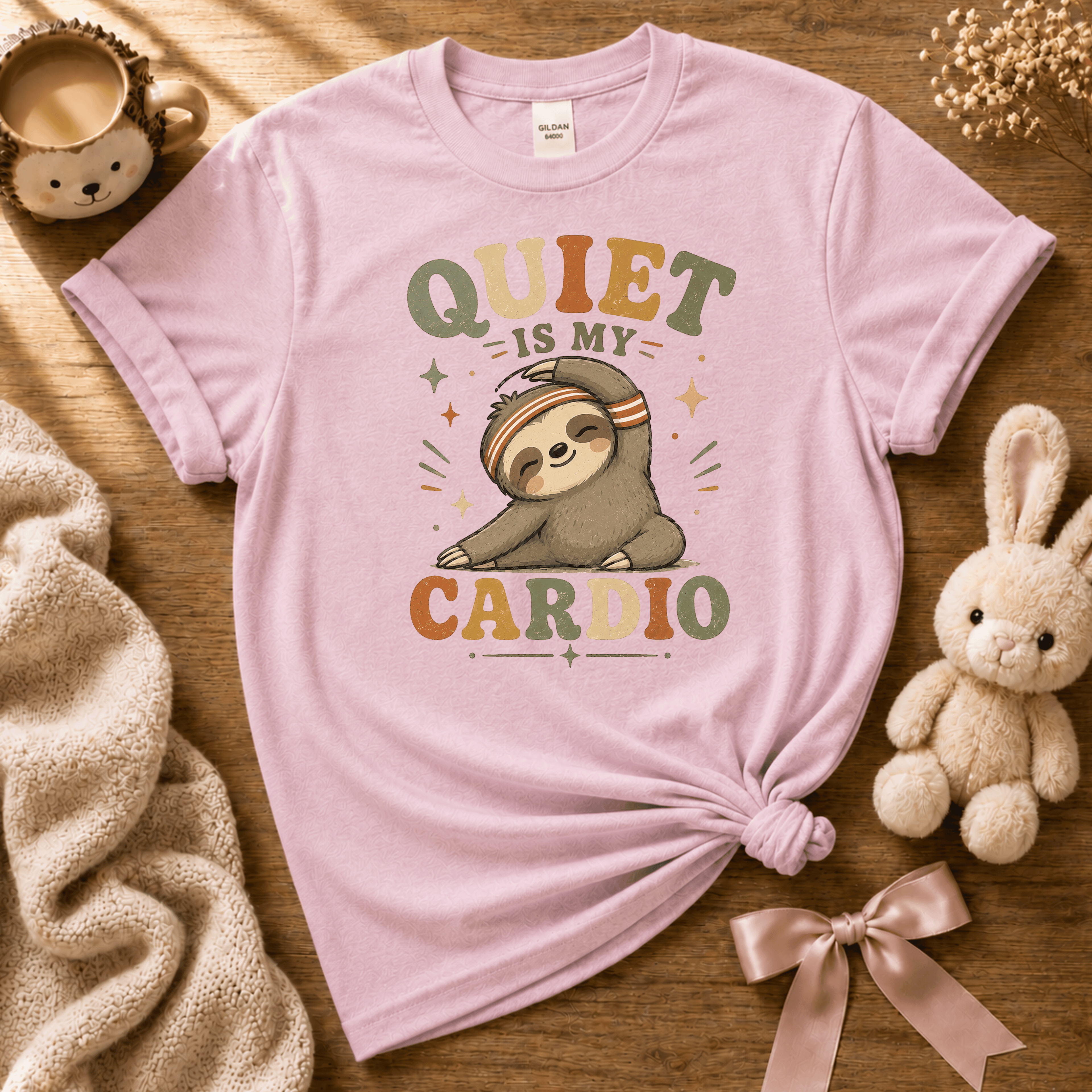 Quiet is My Cardio cute animal graphic t-shirt cozy flat lay in light pink.
