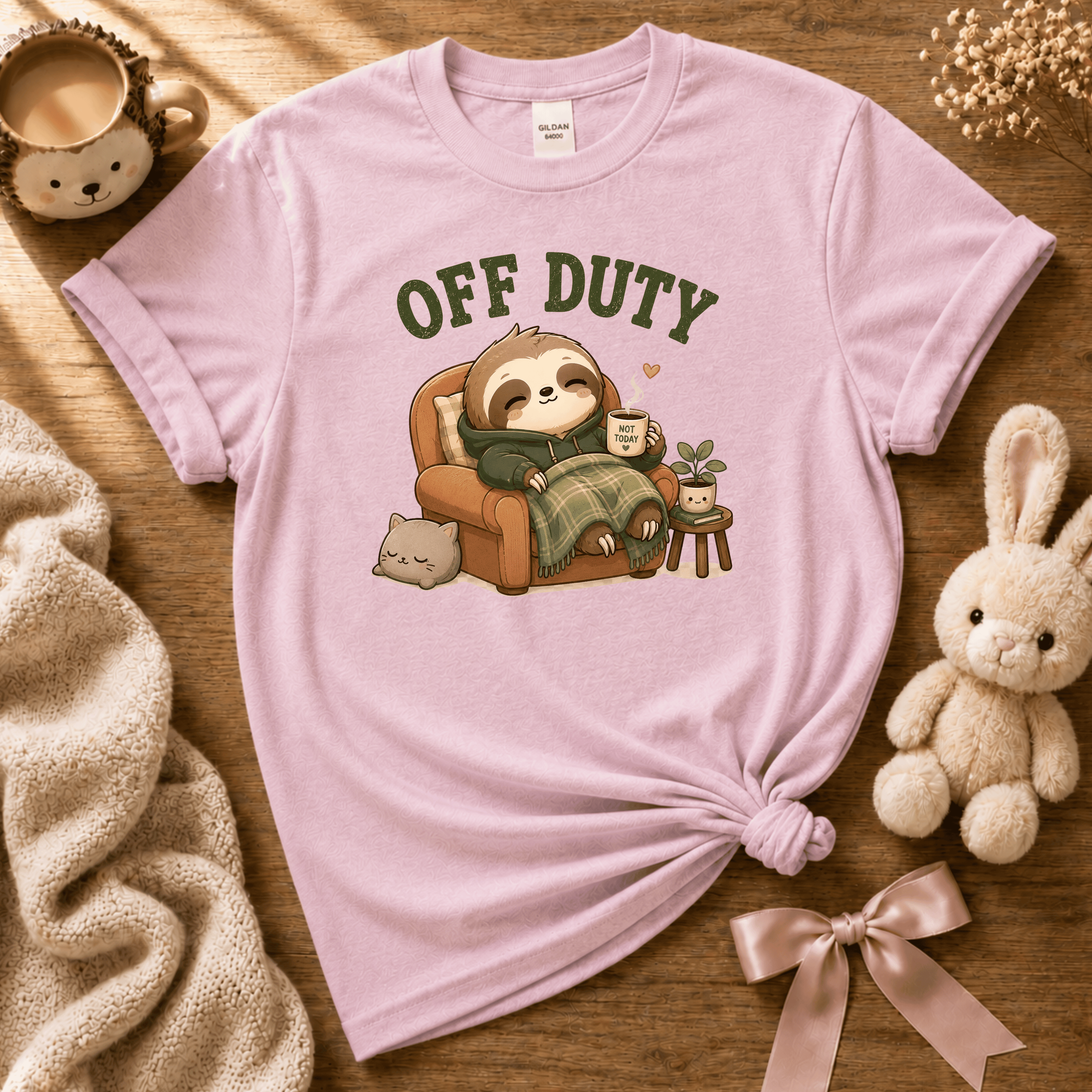 Off Duty cute animal graphic t-shirt cozy flat lay in light pink.